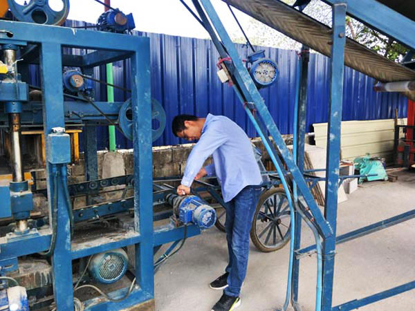 test run of concrete brick machine
