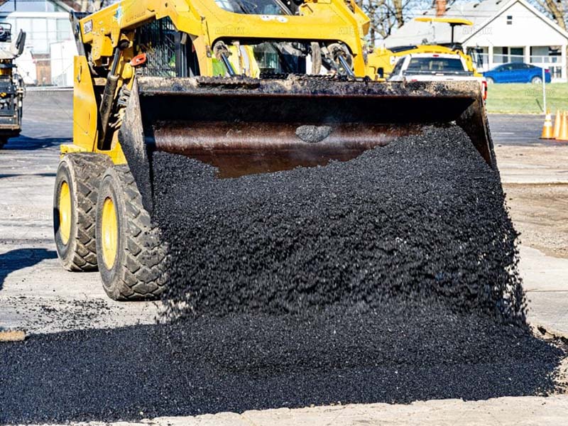 asphalt paving with wheel loader globally