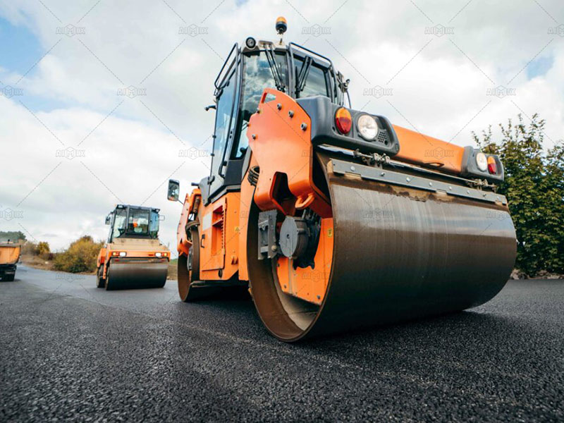 asphalt road building with asphalt rollers